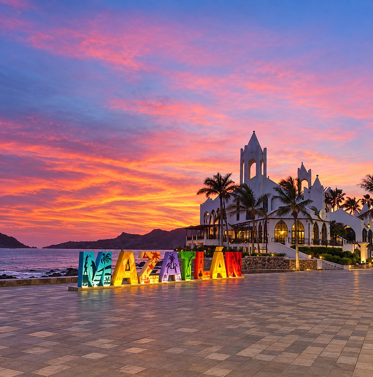 Sunset over the colorful MAZATLÁN letters on the malecón